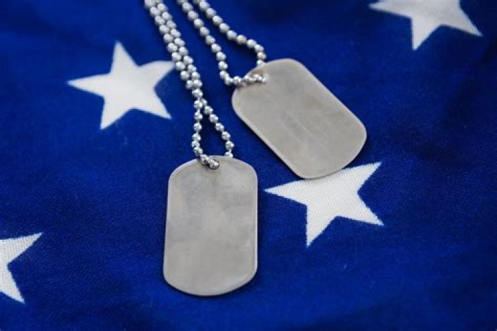 Can civilians wear dog tags?